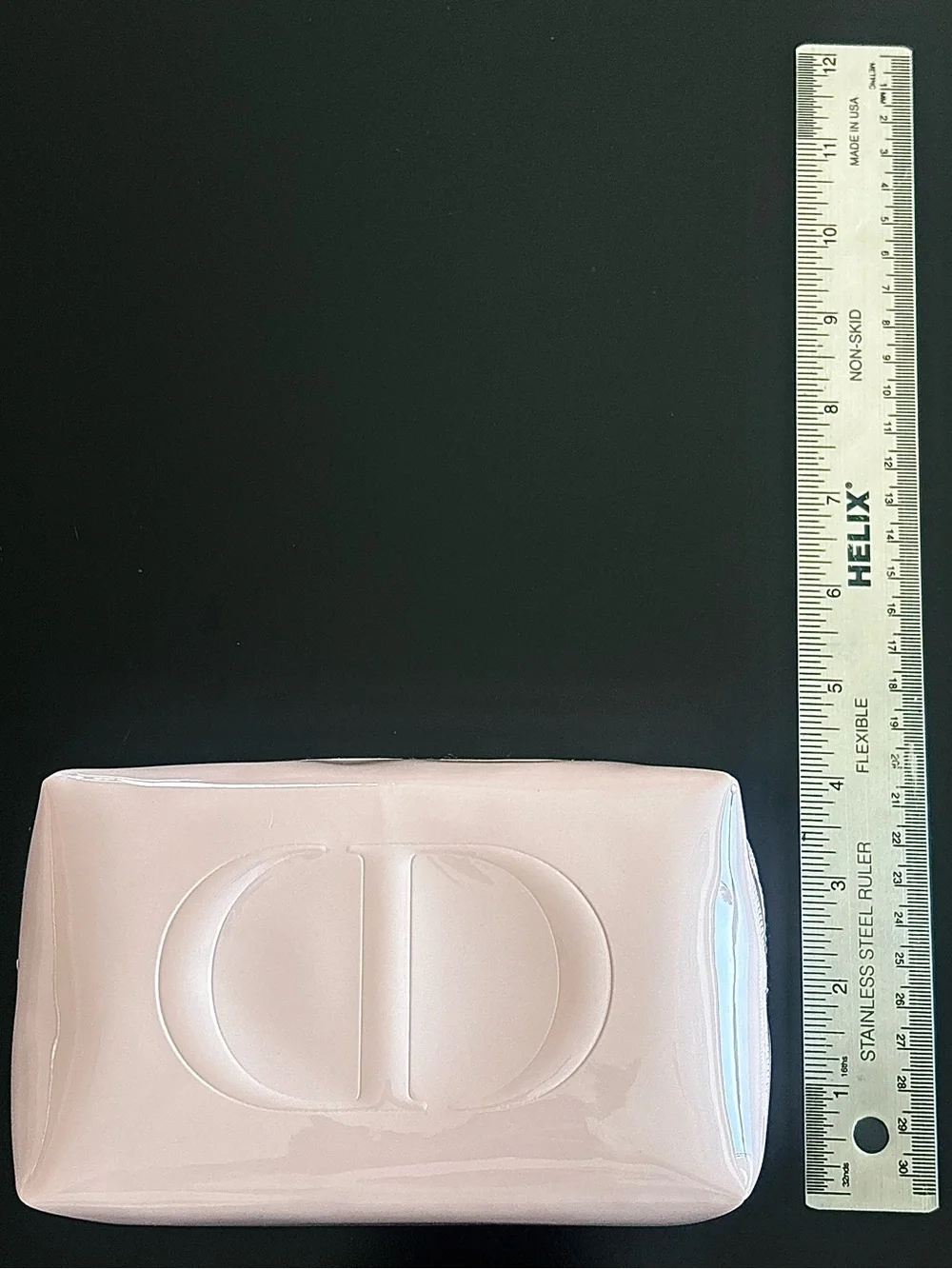 Dior beauty light pink glossy cosmetic bag with embossed CD logo